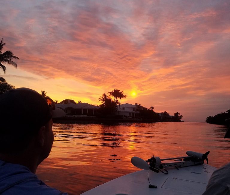 Sunset on the water in Boca Grande, FL during a charter with Captain Morgan Fishing.